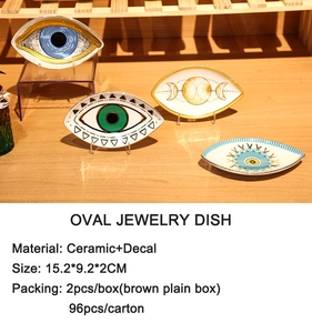 Macro view of ceramic evil eye jewelry trays showing size and material specifications