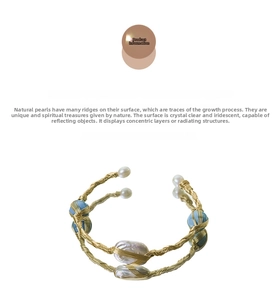 Detail of handcrafted gold wire wrap bracelet with baroque pearls and blue turquoise beads