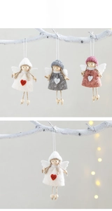 Close-up of handmade angel ornaments with knit hats, felt wings and wooden beads