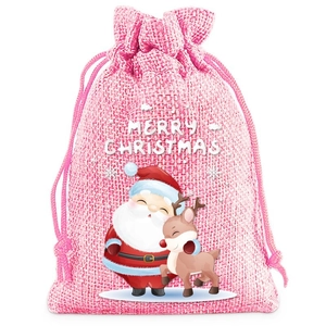 Close-up of pink linen Christmas drawstring bag featuring Santa and reindeer print
