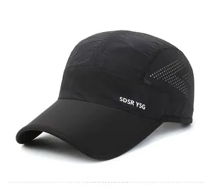 Detail view of black quick-dry baseball cap featuring laser-cut side ventilation holes
