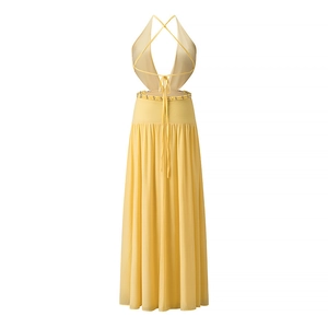 Detail of the yellow halter maxi dress showing exquisite beadwork at the waist and pleated fabric