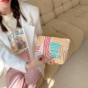 Large striped corduroy cosmetic tote bag with colorful abstract patterns for daily use