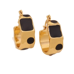 Irregular geometric gold stainless steel earrings with black enamel polka dot pattern
