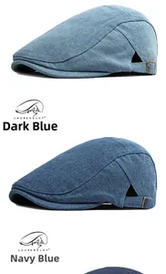 Detail von gewaschenen Denim-Schirmmützen in Navy und Dunkelblau mit Metallschnalle