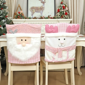 Pink Christmas chair covers featuring Santa and elk designs in soft flannel fabric