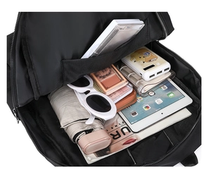 Top view showing the large capacity main compartment of the black nylon backpack