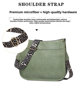 Detail of sage green faux leather tote bag with stylish leopard print shoulder strap