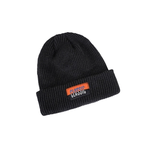 Classic black knitted beanie with thickened fabric and contrast stitch logo patch