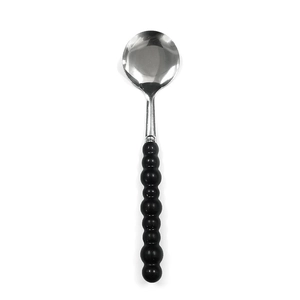 Stainless steel soup spoon featuring a unique black pearl beaded handle on white background