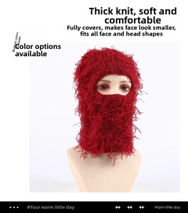 Close-up of red thick knitted balaclava mask with fuzzy mohair texture for winter warmth