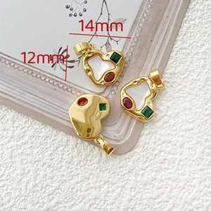 Macro view of heart-shaped 18k gold-plated pendants with dimensions 14mm and 12mm