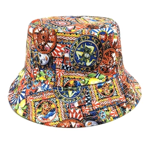 Close-up detail of bohemian canvas bucket hat with vibrant Sicilian floral print