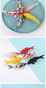 Macro view showing realistic texture and fins of mini PVC koi fish model figurines