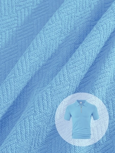 Close-up of light blue waffle knit fabric and polo shirt collar with zipper detail