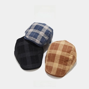Trio of vintage plaid beret hats in blue, black, and brown corduroy fabric