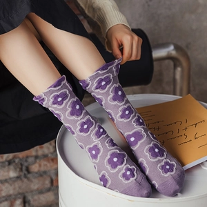 Vintage floral relief socks in purple featuring knitted flower patterns and rolled edges