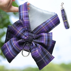 Close-up of purple plaid pet harness with breathable mesh lining and metal D-ring attachment