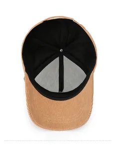 Detailed interior of khaki corduroy baseball cap with soft lining and metal buckle