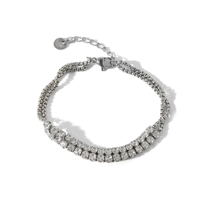 Macro detail of silver double-layer bracelet with double-row cubic zirconia and lobster clasp