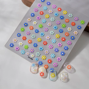 3D colorful flower nail stickers Co-346 shown on nails with embossed jelly texture