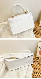 Close-up of white quilted handbag showing back view and flat bottom with gold hardware
