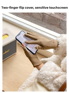 Detail view of flip-top fingers on camel thermal gloves for touchscreen operation