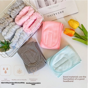 Detailed texture of thick absorbent spa headbands in pink, grey and blue colors