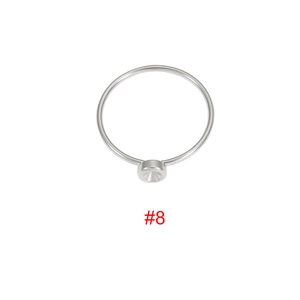 Detailed top view of a polished stainless steel ring with a size 8 mount setting