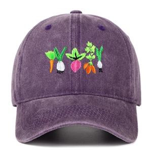 Detailed close-up of colorful plant embroidery on a vintage washed purple baseball cap