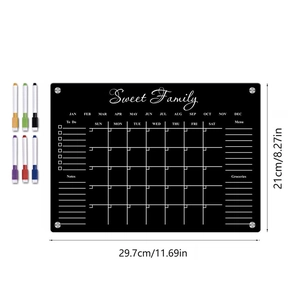 Close-up of black magnetic acrylic weekly planner with colored markers and layout details