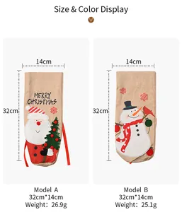 Tableau des tailles montrant les dimensions 32x14cm pour housses de bouteille de Noël