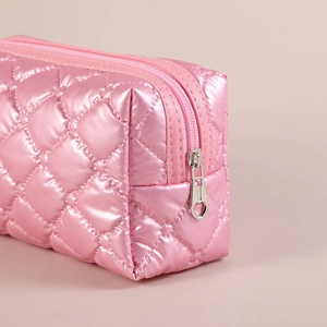 Pink quilted down makeup bag with metallic finish and heart-shaped zipper pull