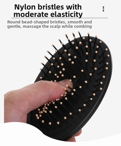 Close-up of flexible nylon bristles with round tips showing the elastic scalp massage function
