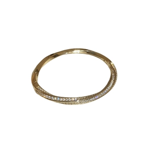 Elegant gold plated star flower bangle with twisted texture and zircon inlay detail