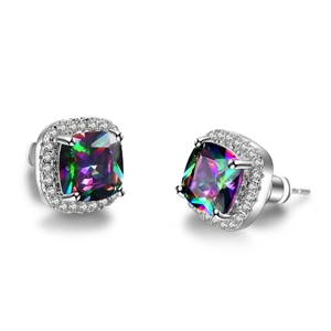 Macro shot of silver stud earrings with square rainbow topaz stones and halo diamond setting