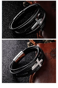 Macro view of men's braided leather bracelet featuring a silver cross and magnetic clasp