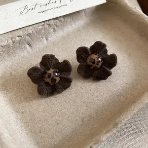Vintage fabric flower earrings with leopard print beads and brown flocked petals