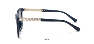 Detail of square navy frames with gold metal temples and elegant pearl chain embellishment