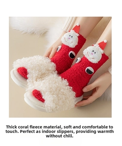 Detailed close-up of thick coral fleece Christmas socks featuring 3D Santa Claus doll