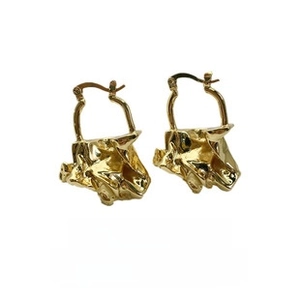 Detail of gold-tone irregular lava earrings with unique wrinkled artistic texture