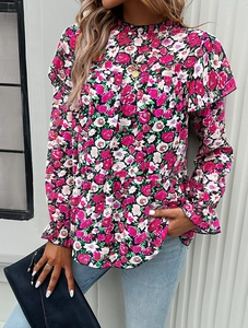 Close-up of floral print blouse featuring ruffle high neck and elegant long sleeves detail