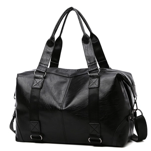 Large capacity black PU leather travel bag with shoulder strap and handles on white background