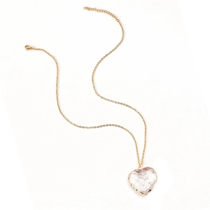 Golden chain necklace featuring a clear crystal heart pendant with ice-crack texture