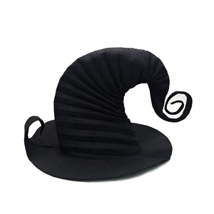 Detail of black pleated witch hat showing spiral texture and curled pointed top design