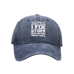 Navy blue vintage washed baseball cap with white printed graphic slogan and wrenches