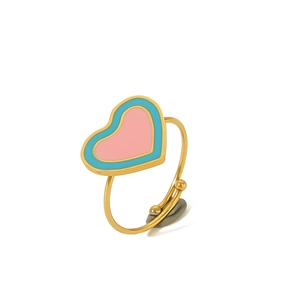 Detail showing colorful enamel heart on a gold adjustable stainless steel ring