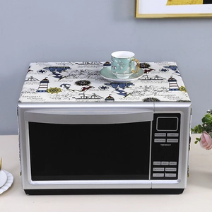 Linen microwave dust cover featuring nautical lighthouse and anchor prints in blue and yellow