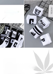 Detail of ribbed mid-calf cotton socks with street style graffiti smile logo