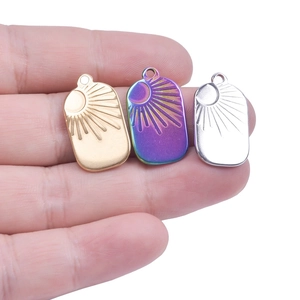 Three-piece sun and moon rectangle charms in gold, silver, and rainbow stainless steel